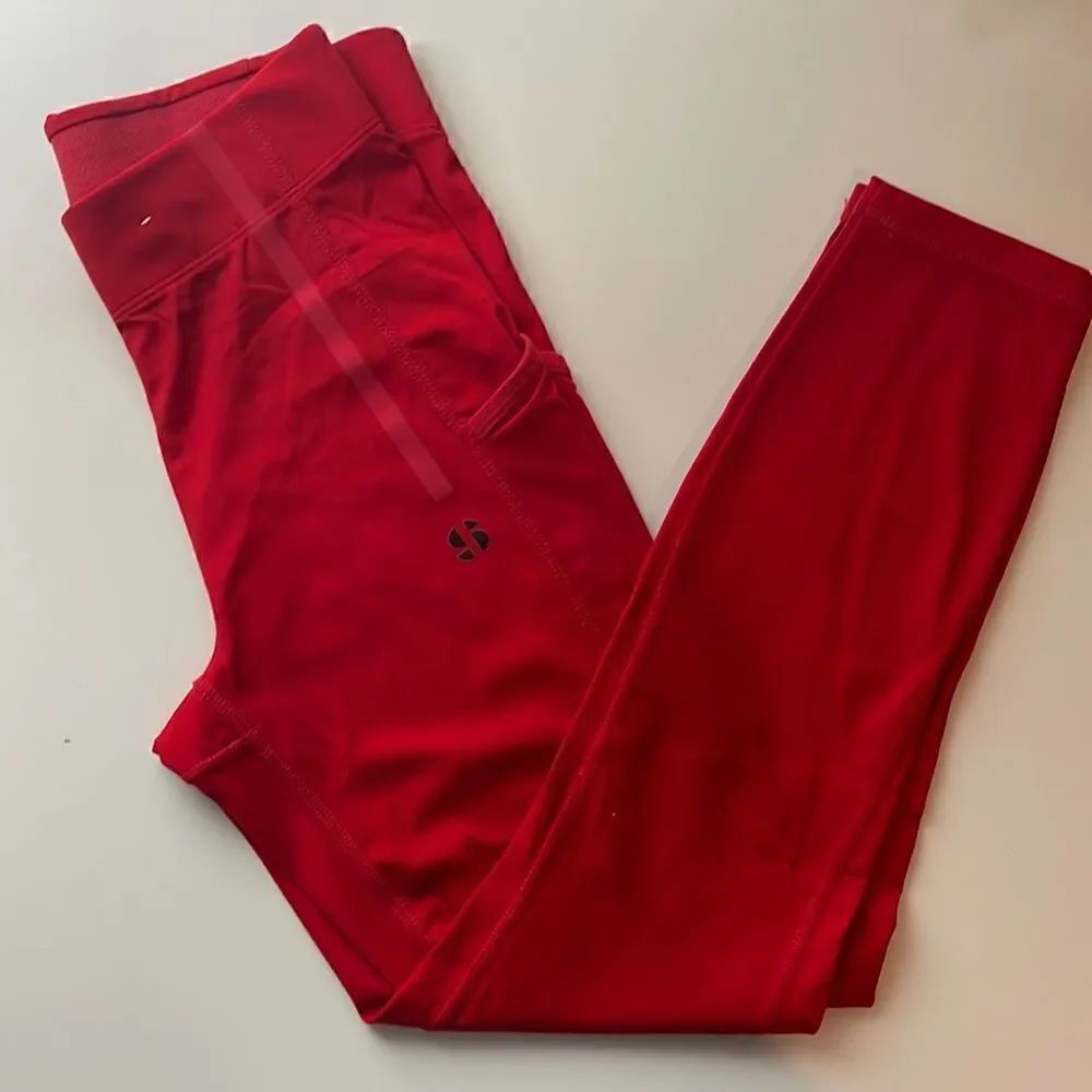 Sports Illustrated athletic leggings. Size Small. Red. NWOT.